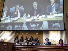Former attorney general William Barr's video deposition is shown at the Jan. 6 hearing. Barr said that he repeatedly told President Donald Trump there was no evidence of election fraud and that at one point he told Trump that his claims were "bogus and silly." MUST CREDIT: Washington Post photo by Jabin Botsford