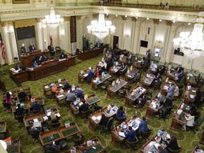 Members of the California state Assembly meet at the Capitol in Sacramento, Calif., Monday, June 20, 2022. California lawmakers will vote on a nearly $308 billion state budget, Wednesday, June 29.