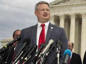 FILE - South Dakota Attorney General Jason Ravnsborg, speaks to reporters in front of the U.S. Supreme Court in Washington on Sept. 9, 2019. Ahead of South Dakota's first-ever impeachment trial next week, state senators are staying silent on how they will vote as they weigh whether to remove Attorney General Jason Ravnsborg for his conduct surrounding a 2020 fatal car crash.