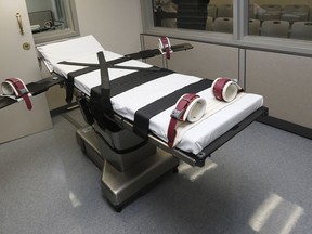 FILE - This photo shows the gurney in the the execution chamber at the Oklahoma State Penitentiary in McAlester, Okla., on Oct. 9, 2014. A federal judge in Oklahoma on Monday, June 6, 2022, ruled the state's three-drug lethal injection method is constitutional, paving the way for the state to request execution dates for more than two dozen death row inmates who were plaintiffs in the case.