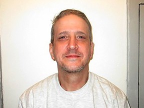 FILE - This Feb. 19, 2021, photo provided by Oklahoma Department of Corrections shows death row inmate Richard Glossip. Oklahoma state Rep. Kevin McDugle a Republican, who is a self-described death-penalty supporter said on Wednesday, June 15, 2022, that a report by a Houston law firm into the conviction of death row inmate Richard Glossip proves Glossip's innocence. McDugle says he believes in the death penalty, but will fight to abolish it in Oklahoma if Glossip is put to death. (Oklahoma Department of Corrections via AP)