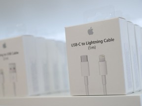 FILE PHOTO: USB-C to Lightning Cable adapters are seen at a new Apple store in Chicago, Illinois, U.S., October 19, 2017. REUTERS/John Gress/File Photo