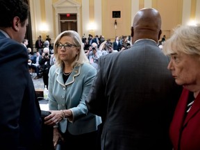 Chairman Bennie Thompson, D-Miss., second from right, Vice Chair Liz Cheney, R-Wyo., second from left, and Rep. Zoe Lofgren, D-Calif., right, stand during a short break as the House select committee investigating the Jan. 6 attack on the U.S. Capitol continues to reveal its findings of a year-long investigation, on Capitol Hill, Monday, June 13, 2022, in Washington.