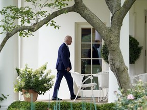 President Joe Biden walks to the Oval Office of the White House after arriving on Marine One, Tuesday, June 14, 2022, in Washington. Biden is returning to Washington after speaking in Philadelphia.