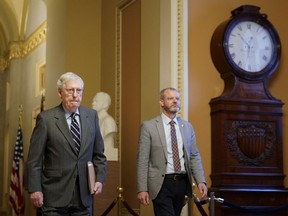 Senate Minority Leader Mitch McConnell of Ky., walks to the Senate Chamber on Capitol Hill in Washington, Thursday, June 9, 2022.