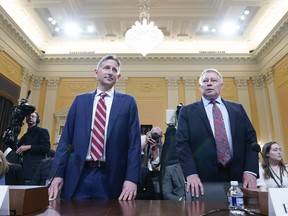 Greg Jacob, who was counsel to former Vice President Mike Pence, left, and Michael Luttig, a retired federal judge, arrive before the House select committee investigating the Jan. 6, 2021, attack on the Capitol holds a hearing at the Capitol in Washington, Thursday, June 16, 2022.
