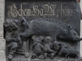 File - The so-called 'Judensau' or 'Jew pig' sculpture is pictured on the facade of the Stadtkirche, Town Church, in Wittenberg, Germany, Jan. 14, 2020. The sculpture is located about 4 meters, 13 feet, above the ground. A German federal court will decide on a Jewish man's bid to force the removal of the 700-year-old antisemitic statue from the church, where Martin Luther once preached.