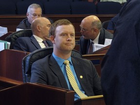 FILE - Alaska state Rep. David Eastman, a Wasilla Republican, is shown seated on the House floor on April 29, 2022, in Juneau, Alaska. The Division of Elections has determined that Rep. Eastman is eligible to run for office after reviewing challenges to his candidacy.