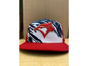The Toronto Blue Jays have altered the design of an upcoming special edition cap, seen in an undated handout photo, which they are set to wear on the Fourth of July.