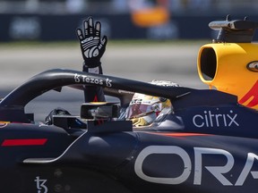 Red Bull driver Max Verstappen of the Netherlands waves to the crowd after winning the Canadian Grand Prix F1 race in Montreal, Sunday, June 19, 2022.