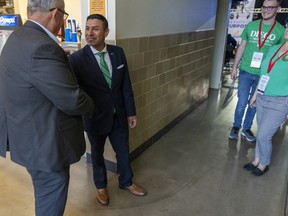 Diego Morales, the GOP pick for Indiana's Secretary of State, shakes a hand at the state GOP Convention, Indiana Farmer's Coliseum, Indianapolis, Saturday, June 18, 2022.