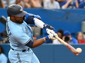 Toronto Blue Jays' Teoscar Hernandez hits a double off Tampa Bay Rays' Ryan Yarbrough in fourth inning American League baseball action in Toronto on Thursday, June 30, 2022.