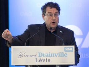 Bernard Drainville, Coalition Avenir Québec candidate for Lévis, speaks at a news conference to confirm his candidacy, Tuesday, June 7, 2022, in Lévis, Que.