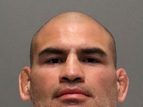 FILE - This photo provided by the San Jose Police Department shows former UFC heavyweight champion Cain Velasquez. Velasquez, the former UFC heavyweight champion accused of trying to kill the man he claims molested his 4-year-old son, is now suing the man and his family who own a daycare where the alleged molestation occurred. Velasquez was arrested in San Jose, California last February after prosecutors said he shot at a pickup carrying the man through busy streets. (San Jose Police Department via AP, File)