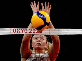 FILE - United States' Jordyn Poulter blocks the ball during the women's volleyball preliminary round at the 2020 Summer Olympics, July 27, 2021, in Tokyo. A stolen Olympic gold medal belonging to Poulter has been found in Southern California, authorities said Wednesday, June 29. Poulter reported the medal stolen May 25 after the Olympian discovered her car broken into at a parking garage in Anaheim, Calif., police said.