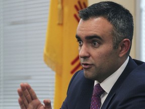 FILE - Bernalillo County District Attorney Raul Torrez speaks to a panel of New Mexico lawmakers during a meeting in Albuquerque, N.M., Sept. 27, 2017. Torrez is running against State Auditor Brian Colón for the Democratic endorsement to succeed termed-out Democratic Attorney General Hector Balderas. Absentee and early in-person vote were underway Thursday, June 2, 2022, in advance of Election Day next Tuesday.