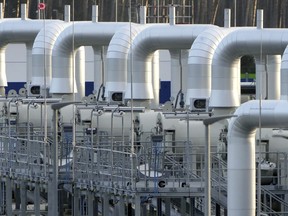 FILE - Pipes at the landfall facilities of the 'Nord Stream 2' gas pipline are pictured in Lubmin, northern Germany, Tuesday, Feb. 15, 2022. It's not a summer heat wave that's making European leaders and businesses sweat. It's fear that Russia's manipulation of natural gas supplies will lead to an economic and political crisis next winter. Or, in the worst case, even sooner.