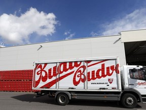 FILE - A truck drives past cases of beer at the Budejovicky Budvar brewery in Ceske Budejovice, Czech Republic, Monday, March 11, 2019. Budvar, the Czech brewer that has been in a long legal dispute with U.S. company Anheuser-Busch over use of the Budweiser brand, said Wednesday, June 29, 2022 its net profit reached 337 million Czech crowns in 2021 ($14.4 million), up by 10.5% from 305 million the previous year.