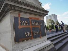 A Nazi swastika is seen graffitied on the front of the Victorian State Parliament, In Melbourne, Australia, on Oct. 1, 2012. Victoria has become the first Australian jurisdiction to ban the Nazi swastika, Wednesday, June 22, 2022 and takes effect in 6 months.
