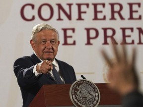 Mexico's President Andres Manuel Lopez Obrador calls on a journalist during his daily press conference at the National Palace, in Mexico City, Wednesday, June 22, 2022.