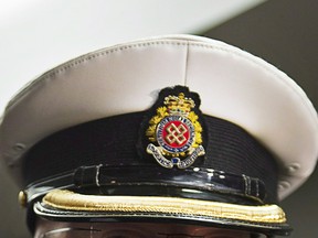 Close-up of a Royal Canadian Navy junior officer's peaked cap.