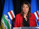 Alberta Wildrose leader Danielle Smith tells reporters in Calgary, Tuesday, Oct.28, 2014 she has requested a leadership review in the wake of failing to win any of Alberta's four byelections. THE CANADIAN PRESS/Bill Graveland ORG XMIT: 07318910