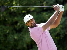 Tony Finau of the United States hits his tee shot on the 17th hole during round three of the Canadian Open at St. George's Golf and Country Club in Toronto on Saturday, June 11, 2022.&ampnbsp;Finau fired an 8-under 62 and Rory McIlroy had a clutch birdie on No. 15 to become co-leaders at the RBC Canadian Open.