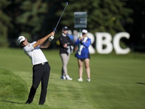Canadian Corey Conners hits his approach shot on the 17th fairway during the Canadian Open Pro-Am in Toronto on Wednesday, June 8, 2022.