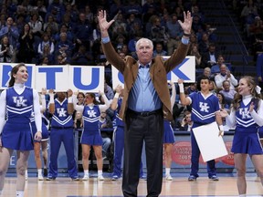 This photo provided by University of Kentucky Athletics shows Mike Pratt gesturing to fans after Kentucky beat Georgia in an NCAA college basketball game at Rupp Arena in Lexington, Ky., Dec. 31, 2017. Kentucky Athletics Hall of Famer Mike Pratt, who helped lead the Wildcats to three SEC championships and two Elite Eight appearances, has died. He was 73. Pratt, a UK Sports Network men's basketball radio color analyst since 2001, died Thursday, June 16, 2022, a statement from the school said.