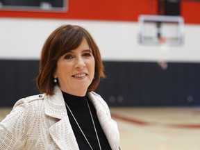 This photo provided by ESPN shows Carol Stiff on the ESPN basketball court in Bristol, Conn., Jan. 24, 2020. Some of the giants of women's basketball say if not for Title IX, doors would not have been open for them to blaze trails to Hall of Fame careers on and off the court, but sound complacency alarms when it comes to the future of the law. Stiff, a basketball player/coach turned TV executive, called Title IX priceless.