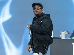 FILE - Roddy Ricch performs at day one of the Astroworld Music Festival at NRG Park on Nov. 5, 2021, in Houston. Authorities have dropped criminal charges against Ricch following a gun arrest Saturday, June 11, 2022, in New York City that forced him to miss a scheduled concert performance.