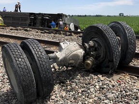 In this photo provided by Dax McDonald, debris sits near railroad tracks after an Amtrak passenger train derailed near Mendon, Mo., on Monday, June 27, 2022. The Southwest Chief, traveling from Los Angeles to Chicago, was carrying about 243 passengers when it collided with a dump truck near Mendon, Amtrak spokeswoman Kimberly Woods said.