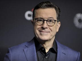 FILE - Stephen Colbert attends the 36th Annual PaleyFest "An Evening with Stephen Colbert" in Los Angeles on March 16, 2019. Colbert says that his staff members arrested at a congressional office building last week were guilty of 'first-degree puppetry.' His 'Late Show' monologue Monday was his first time addressing the Thursday incident. U.S. Capitol Police detained comics including the voice of Triumph the Insult Comic Dog.