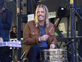 FILE - Musician Taylor Hawkins appears at One Love Malibu in Calabasas, Calif., on Dec. 2, 2018. Foo Fighters will honor the rock band's late drummer Taylor Hawkins with a pair of tribute concerts in September -- one in London and the other in Los Angeles. The twin shows will take place Sept. 3 at London's Wembley Stadium and Sept. 27 at The Kia Forum in Los Angeles. Hawkins died March 25, 2022, during a South American tour with the rock band. He was 50.