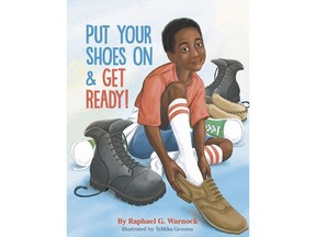 This cover image released by Philomel shows "Put Your Shoes On & Get Ready" by Raphael G. Warnock. The Georgia senator will have a children's book out this fall, a picture story based on his being one of 12 siblings. Philomel Books, an imprint of Penguin Young Readers, announced Thursday that Warnock's "Put On Your Shoes and Get Ready!" will be published Nov. 15. (Philomel via AP)