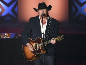 FILE - Honoree Toby Keith performs at the 46th annual Songwriters Hall of Fame Induction and Awards Gala at the Marriott Marquis on June 18, 2015, in New York. Keith announced Sunday, June 12, 2022, that he has been undergoing treatment for stomach cancer since last fall. The multi-platinum-selling singer said on Twitter that he underwent surgery and received chemotherapy and radiation in the past six months .