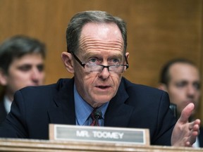FILE - Ranking member Sen. Pat Toomey, R-Pa., speaks during a Senate Banking, Housing, and Urban Affairs Committee hearing, Tuesday, May 10, 2022, on Capitol Hill in Washington. After the latest cryptocurrency implosion, Washington appears ready to take its first steps to regulate the industry. Toomey is circulating a bill focused on regulating stablecoins, which would require stablecoin providers to have a license to operate, restrict the types of assets they carry to back those stablecoins, as well as be subject to routine auditing to make sure they are complying.