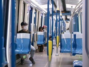 Commuters ride a near-empty subway train in Montreal, on Monday, May 25, 2020. CANADIAN PRESS/Paul Chiasson
