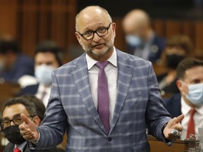 Justice Minister and Attorney General David Lametti rises during Question Period in the House of Commons on Parliament Hill in Ottawa on Tuesday, June 7, 2022.&ampnbsp;Federal MPs are expected to vote this afternoon on whether to adopt the Liberals' mandatory minimums bill and send it to the Senate. Bill C-5 would amend the Criminal Code to remove mandatory minimum sentences for all drug convictions and for some firearms and tobacco-related offences.THE CANADIAN PRESS/ Patrick Doyle
