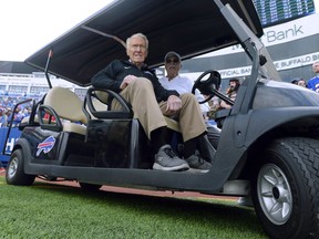 Former Buffalo Bills head coach Marv Levy watches the team warm up before an NFL football game between the Bills and the New England Patriots, Sunday, Sept. 29, 2019, in Orchard Park, N.Y. On Friday night, the former Montreal Alouettes head coach will be inducted into the Canadian Football Hall of Fame.