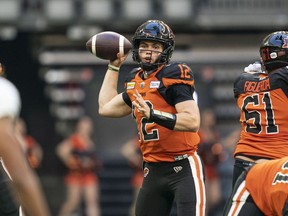BC Lions quarterback Nathan Rourke throws a pass during first half of CFL football action against the Toronto Argonauts in Vancouver, B.C., Saturday, June 25, 2022. The Ottawa Redblacks are still looking for its first win and know they will need to be at their best when they host the high-scoring B.C. Lions on Thursday.THE CANADIAN PRESS/Rich Lam