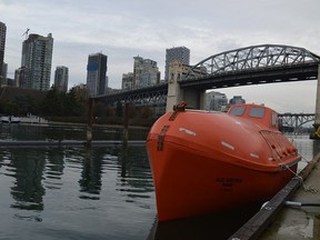 A lifeboat that dropped from a ship in English Bay in December 2020, injuring two crew members, is seen moored in Vancouver in this undated handout photo. The Transportation Safety Board has concluded its report into the accident. The report says the crewmembers were seriously hurt when they fell 14 metres to the water after slings holding up the boat released. THE CANADIAN PRESS/HO-Transportation Safety Board of Canada **MANDATORY CREDIT**