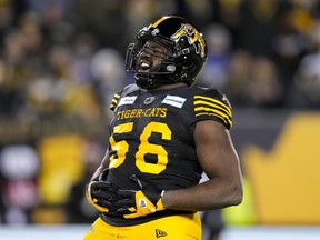 Every year he's been in the league, Ja'Gared Davis has finished the season in the Grey Cup game. Davis celebrates a sack against the Winnipeg Blue Bombers during first half football action in the 108th CFL Grey Cup in Hamilton, Ont., on Sunday, December 12, 2021.