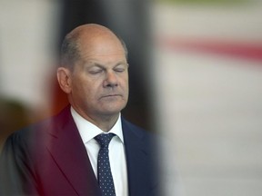 German Chancellor Olaf Scholz waits for the arrival of Slovakia's Prime Minister Eduard Heger for a meeting at the chancellery in Berlin, Germany, Monday, June 13, 2022.