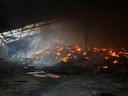 Seeds burn in a grain silos after it was shelled repeatedly, amid Russia's invasion of Ukraine, in Donetsk region, Ukraine May 31, 2022.  REUTERS/Serhii Nuzhnenko
