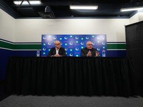 Vancouver Canucks general manager Patrik Allvin, left, and president of hockey operations Jim Rutherford attend an end of NHL hockey season news conference, in Vancouver, on Tuesday, May 3, 2022. The Canucks have signed Swedish forward prospect Nils Aman to an entry-level contract.