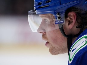Vancouver Canucks' Sheldon Dries lines up for a faceoff against the Arizona Coyotes during the third period of an NHL hockey game in Vancouver, on Thursday, April 14, 2022. The Canucks have signed forward Sheldon Dries, defenceman Guillaume Brisebois, and forward John Stevens to two-way contracts.THE CANADIAN PRESS/Darryl Dyck