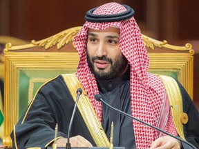 FILE - In this photo released by Saudi Royal Palace, Saudi Crown Prince Mohammed bin Salman, speaks during the Gulf Cooperation Council (GCC) Summit in Riyadh, Saudi Arabia, Dec. 14, 2021. After President Joe Biden took office, his administration made clear the president would avoid direct engagement with the country's defacto leader, Crown Prince Mohammed bin Salman, after U.S. intelligence officials concluded that he likely approved the 2018 killing and dismemberment of U.S.-based journalist Jamal Khashoggi.
