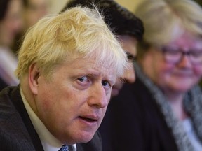 Britain's Prime Minister, Boris Johnson speaks during a Cabinet meeting at 10 Downing Street, in London, Tuesday, June 14, 2022.