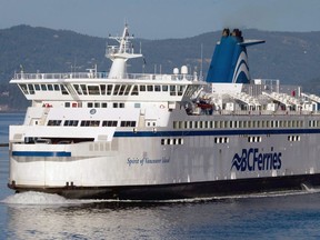 The BC Ferries vessel Spirit of Vancouver Island passes between Galiano Island and Mayne Island while travelling from Swartz Bay to Tsawwassen, B.C., on Aug. 26, 2011.